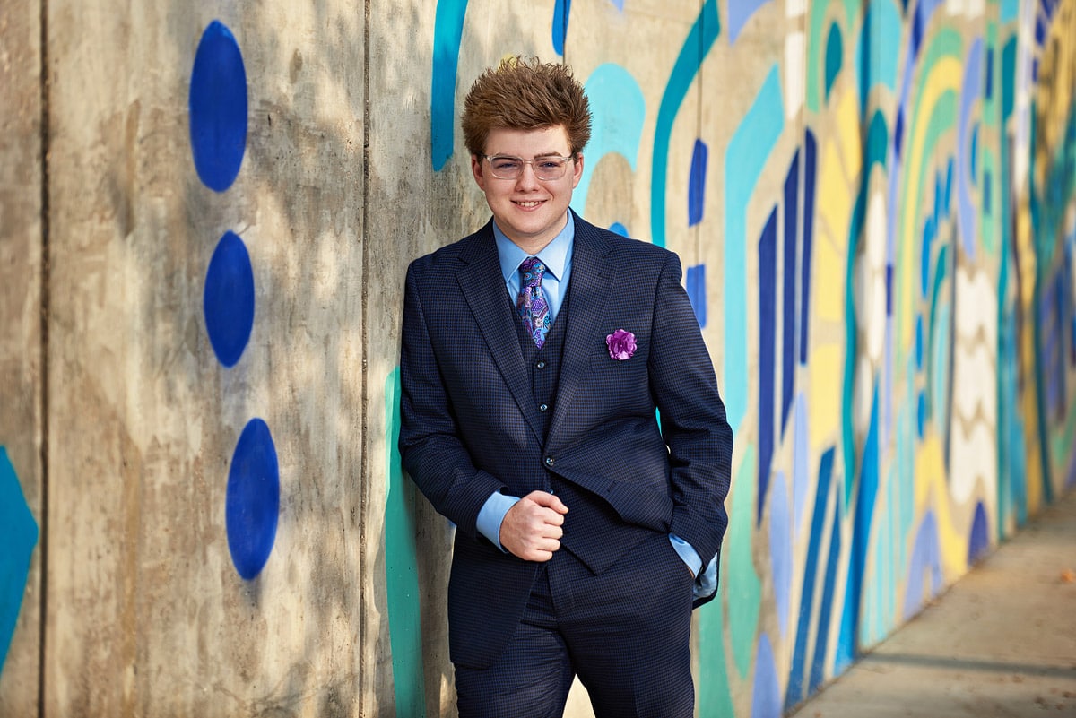 prosper senior portrait of zane in downtown dallas texas graffiti wall